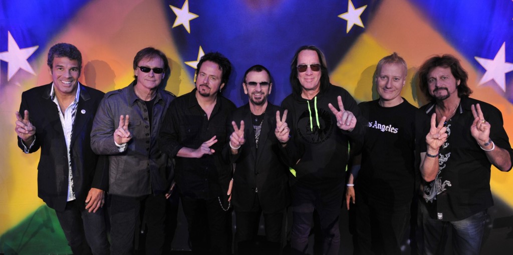 Ringo Starr and his All Starr Band - 2012. Photograph by Rob Shanahan June 13, 2012. L to R: Mark Rivera, Richard Page, Steve Lukather, Ringo Starr, Todd Rundgren, Gregg Bissonette, Gregg Rolie